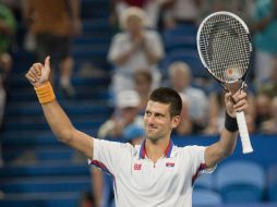 El tenista serbio Novak Djokovic celebra su victoria tras el partido contra el italiano Andreas Seppi en la Copa Hopman. EFE  /