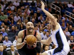 Carlos Boozer logró su mejor producción de la temporada con 31 puntos y 11 rebotes. AP AP /