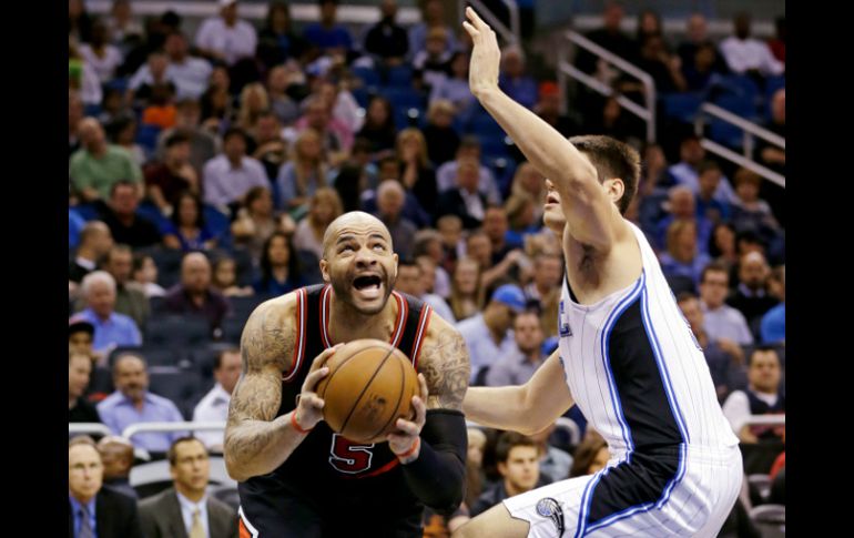 Carlos Boozer logró su mejor producción de la temporada con 31 puntos y 11 rebotes. AP AP /