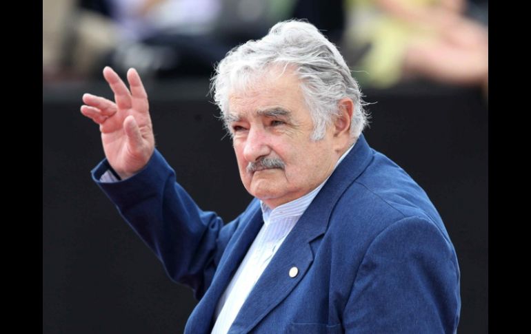 El presidente uruguayo José Mujica, no creyente, participó en una misa que él mismo convocó para pedir por la salud de Chávez. ARCHIVO  /