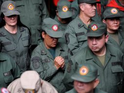 Mujeres militares oran por la salud de Chávez. ARCHIVO /