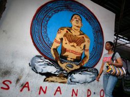 Un grafiti de Chávez en Caracas. El mandatario convalece en Cuba tras la cuarta operación contra el cáncer. REUTERS /