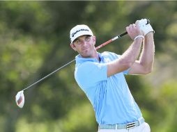 Dustin Johnson, su score total fue de 203 (-16). AFP /