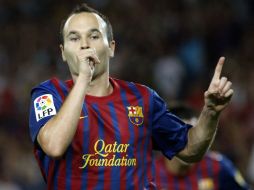 Iniesta fue uno de los nominados, junto a Messi y Ronaldo, al Balón de Oro del año pasado. ARCHIVO /