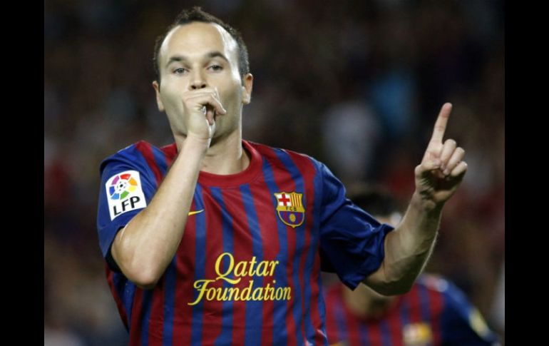 Iniesta fue uno de los nominados, junto a Messi y Ronaldo, al Balón de Oro del año pasado. ARCHIVO /