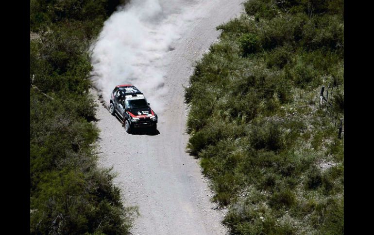 El ganador de las pruebas con autos, Orlando Terranova, conduce un BMW. AFP /