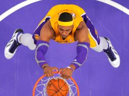 Dwight Howard anotó 31 puntos y realizó 16 rebotes. AP /