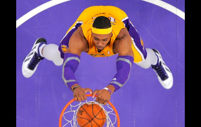 Dwight Howard anotó 31 puntos y realizó 16 rebotes. AP /