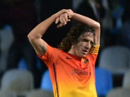 Puyol debutó hace casi 14 años con el Barça y se ha convertido en histórico del club. REUTERS /