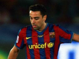 Xavi, junto a Puyol y Messi, han decidido seguir vistiendo los colores del Barcelona. MEXSPORT /