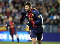 Gerard Pique habla de la semifinal de la próxima semana ante el Real Madrid. AP /