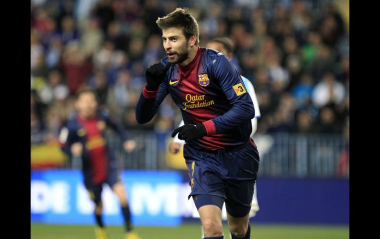 Gerard Pique habla de la semifinal de la próxima semana ante el Real Madrid. AP /