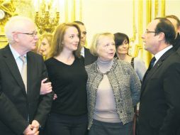 Florence Cassez, se reunió con el mandatario galo François Hollande, en una recepción en el Palacio del Elíseo. AFP /