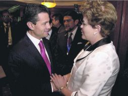 Relación bilateral.Enrique Peña Nieto y la mandataria brasileña, Dilma Rousseff, sostuvieron un encuentro en Santiago de Chile. XINHUA /