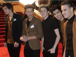 En tanto que los jóvenes de One Direction se impusieron como GrupoDúo Internacional del Año. AP /