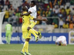 Los jugadores celebran la calificación y el camino al título africano. AFP /