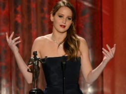 Todas las quinielas apuntan a Jennifer Lawrence como posible acompañante del actor. AFP /