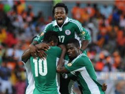 Nigeria celebra su pase y la eliminación de los marfileños. AFP /