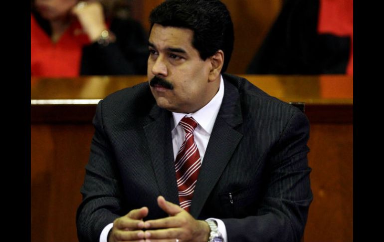 El vicepresidente Maduro llama a asistir a la marcha. AP /