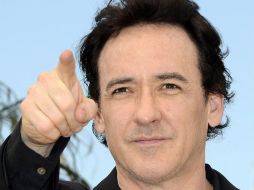 John Cusack interpreta al escritor, ''Jackson Curtis'' quien debe proteger a su familia. ARCHIVO /