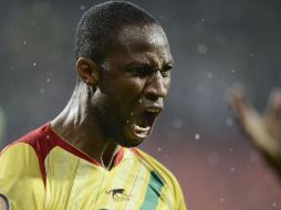 Seydou Keita grita la anotación que consiguió en el duelo ante Ghana. AFP /