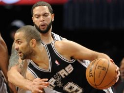 Tony Parker (9) y los Spurs cosechan triunfos y siguen con la mejor marca en la Conferencia Oeste. AP /