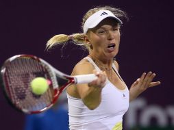 Wozniacki no sufrió variaciones en su puntaje pero fue ayudada por la derrota de Bartoli. AFP /