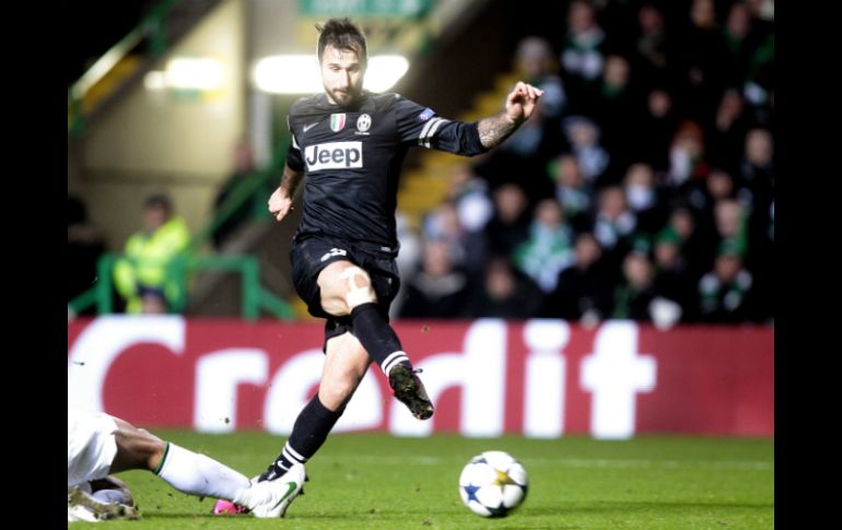 Mirko Vucinic fue quien sentenció el partido con el tercer gol al minuto 83. AFP /