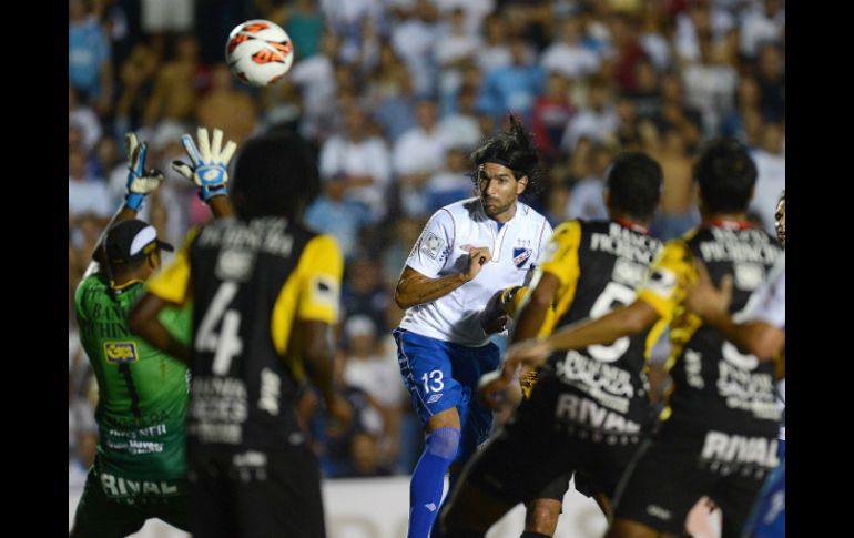 Ambos equipos sudamericanos debutaron en el Grupo 1 de la Copa Libertadores-2013. AFP /