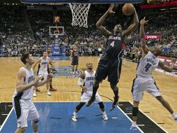 Acción del partido entre Atlanta y Orlando de la NBA. AP /