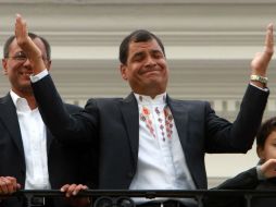 El mandatario ecuatoriano muestra su felicidad tras conocer los resultados. AP /