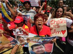 Venezolanos recibieron con furor la noticia del regreso de Chávez a su país. ARCHIVO /