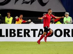 Richard Ruiz festaja el gol que le dio los tres puntos al cuadro mexicano. EFE /