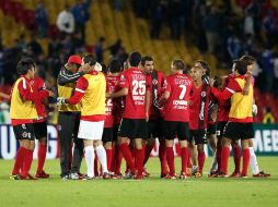 Los jugadores de Xolos celebran luego de la victoria de anoche en la Copa Libertadores. EFE /