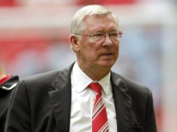 El entrenador del Manchester United, Alex Ferguson, y sus ''diablos rojos''  son líderes de la Liga inglesa con doce puntos de ventaja. ARCHIVO /