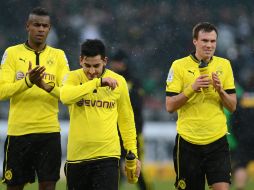 Los jugadores del Borussia Dortmund saben que tiene complicada la lucha por el título en Alemania. AFP /