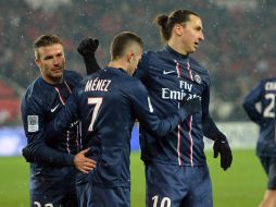 Beckham, Ménez e Ibrahimovic celebran un gol del PSG en el partido. AFP /