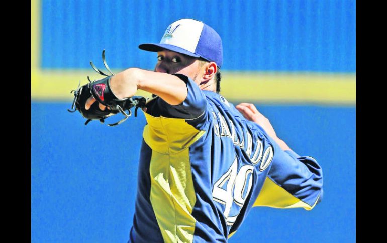 Yovani Gallardo ha sido el pitcher designado para el partido inaugural de Milwaukee durante las últimas tres campañas. AP /