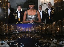 Un ejemplo es: Michell Obama nombró al ganador al Oscar a mejor actor en directo. AP /