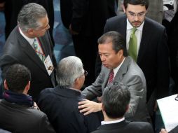 El presidente del CEN del PRI, César Camacho Quiroz (d), durante la 21 Asamblea Nacional. NTX /