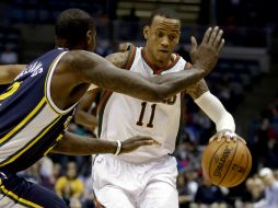 Monta Ellis (der) se luce con 34 puntos durante el juego. AP /