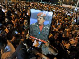 Un ejemplo puede ser: algunos venezolanos viven la etapa del poschavismo con tristeza.. AFP /