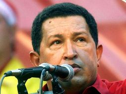 Hugo Chávez jugó beisbol en sus días de Academia Militar. AP /