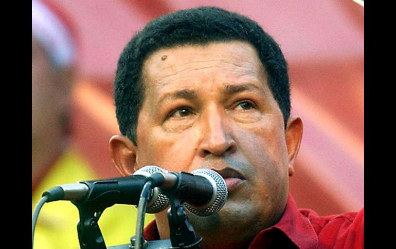 Hugo Chávez jugó beisbol en sus días de Academia Militar. AP /