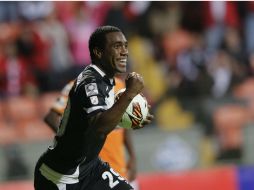 Luis Tejada celebra el gol del empate. AP /