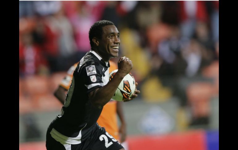 Luis Tejada celebra el gol del empate. AP /