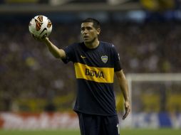 Juan Román Riquelme no ha podido meter de lleno a Boca Juniors en la pelea en los torneo que disputan. AP /