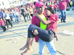 Según el gobierno, dos millones de personas acudieron a Caracas a ver por última vez al presidente, lo que generó situaciones de riesgo AFP /