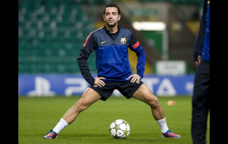 Xavi se prepara para regresar con el Barcelona y remontar ante el Milán en la Champions. ARCHIVO /