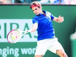 Convincente. Roger Federer pasó por encima de Denis Istomin en su debut en el certamen californiano. AFP /